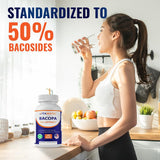 Vitamatic frasco junto a hojas de Bacopa resaltando origen vegetal