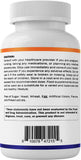 Comparación de tamaño de tableta Vitamatic junto a una moneda para referencia de escala