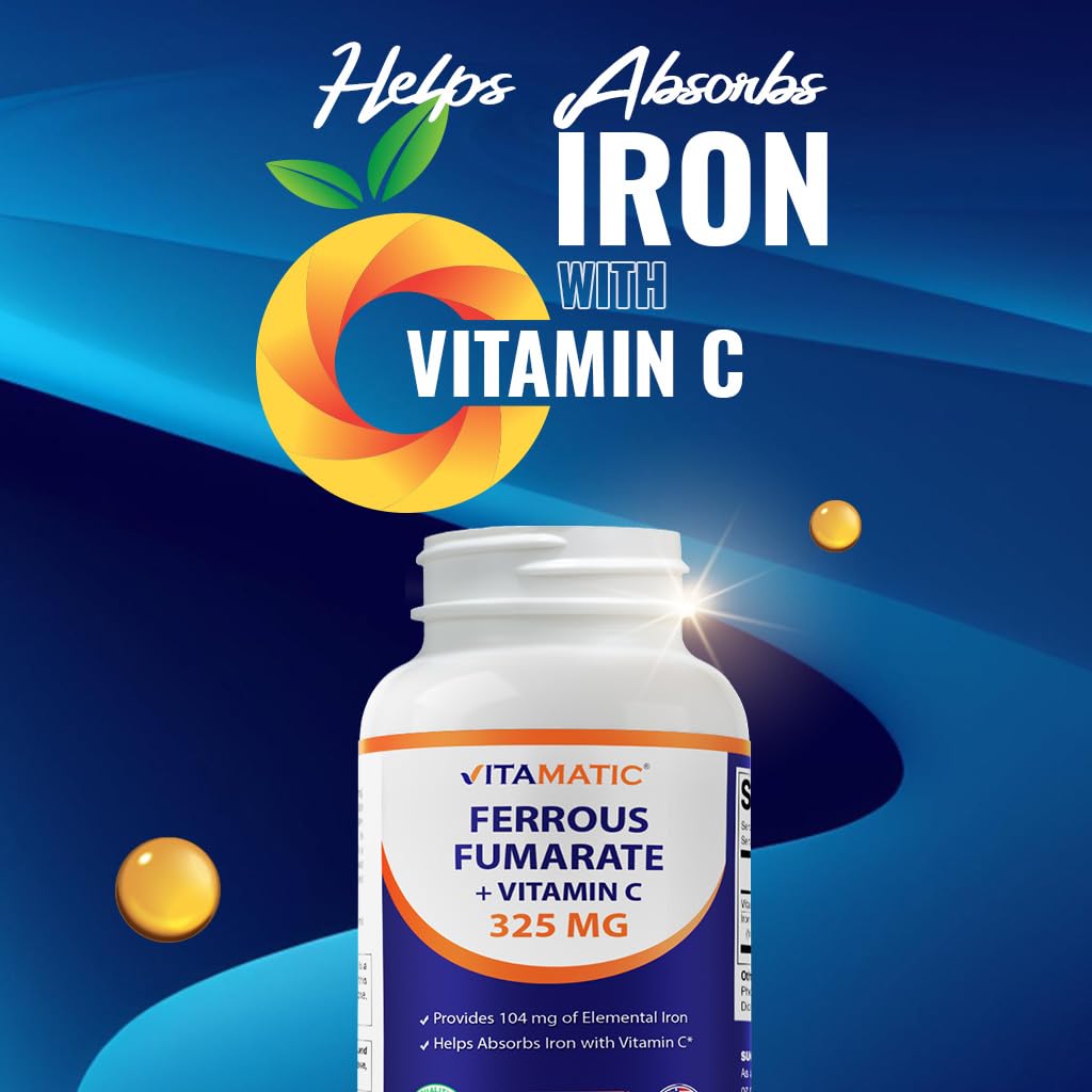 Vitamatic comprimido junto a una moneda para comparar tamaño real