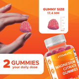 Comparación de tamaño Vitamatic con moneda para referencia de escala