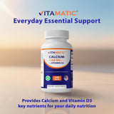 Vitamatic tabletas junto a una moneda para comparar tamaño