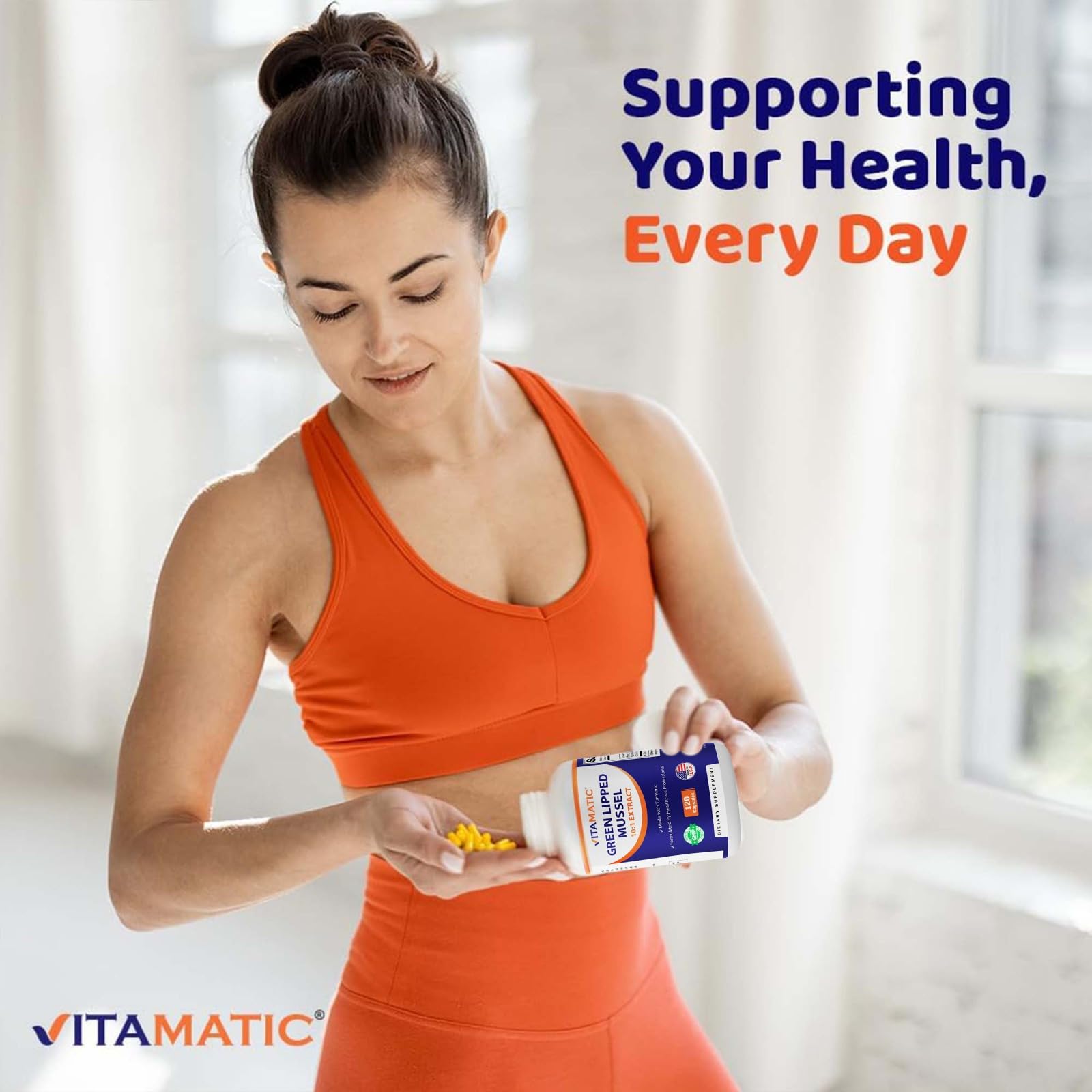 Vitamatic tamaño comparativo de la cápsula junto a una moneda para escala