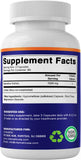 Vitamatic cápsulas sobre mesa junto a vaso de agua indicando uso diario práctico