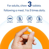 Vitamin World suplemento junto a un plato para apoyar digestión tras comidas