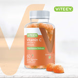 Detalle de una gomita Viteey mostrando textura y color naranja natural, atractivo al paladar