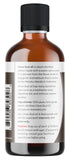 Viva Doria botella junto a una regla que indica 118 mL para referencia de tamaño