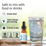 Vaso con agua y gotas de Waiora NCD2 mezclándose para administración diaria simple