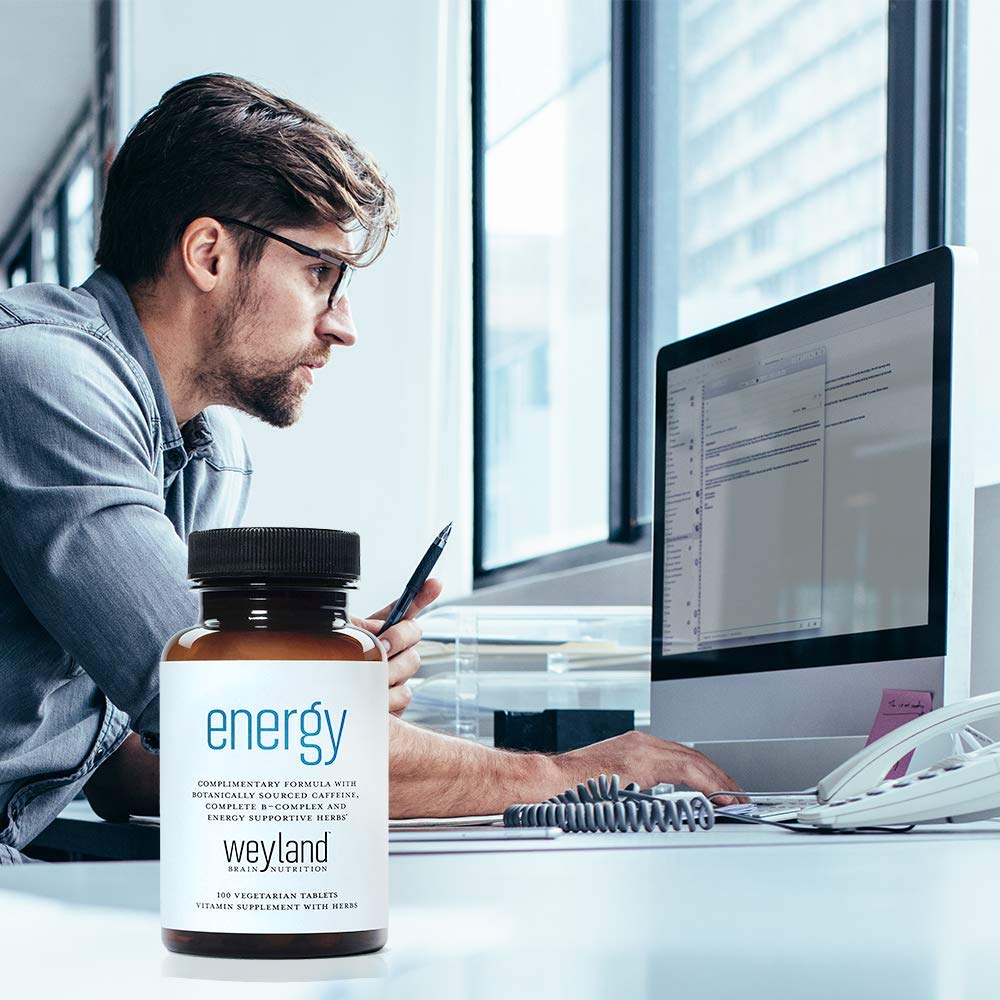 Weyland Brain Nutrition Energy frasco sobre escritorio, beneficio productividad