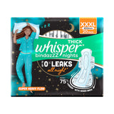 Whisper toalla en uso nocturno en cama ilustrando protección y tranquilidad