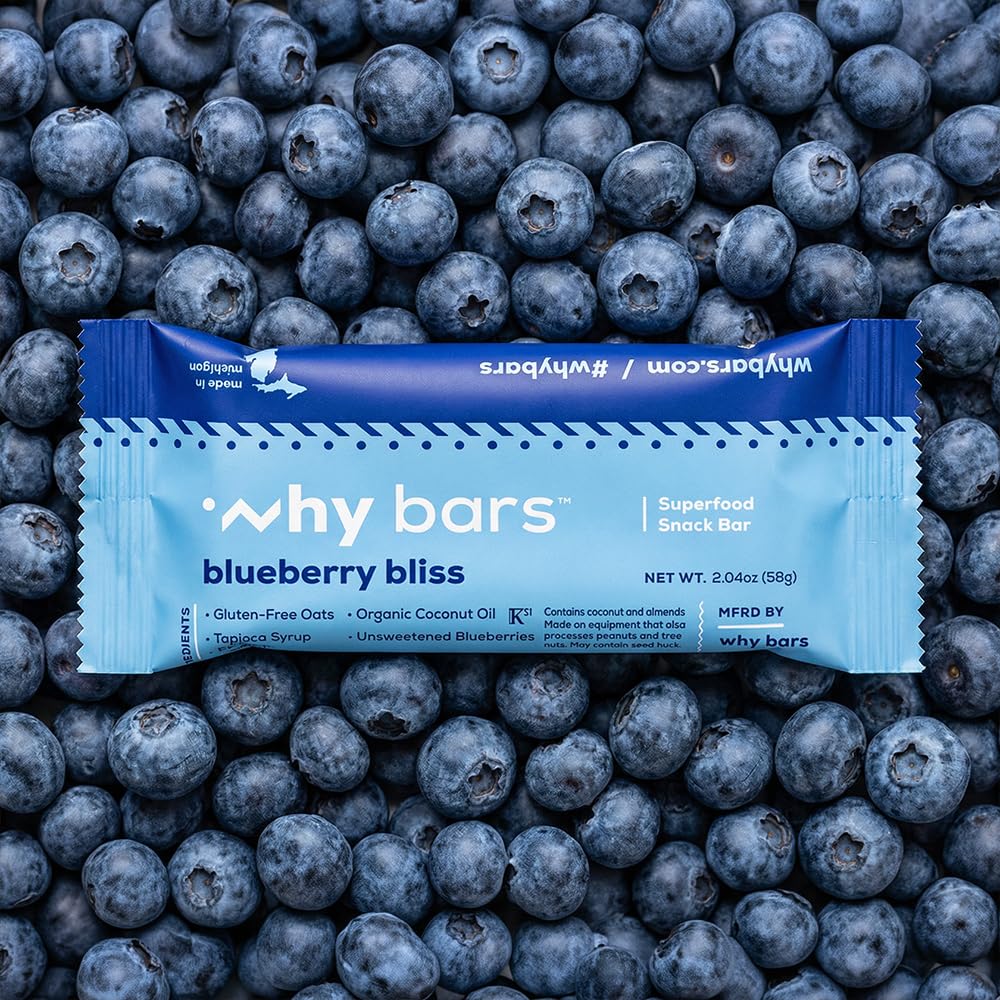 Why Bars detalle de textura interior con arándanos y miga nutritiva