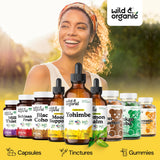 Wild & Organic botella junto a una regla para comparar tamaño