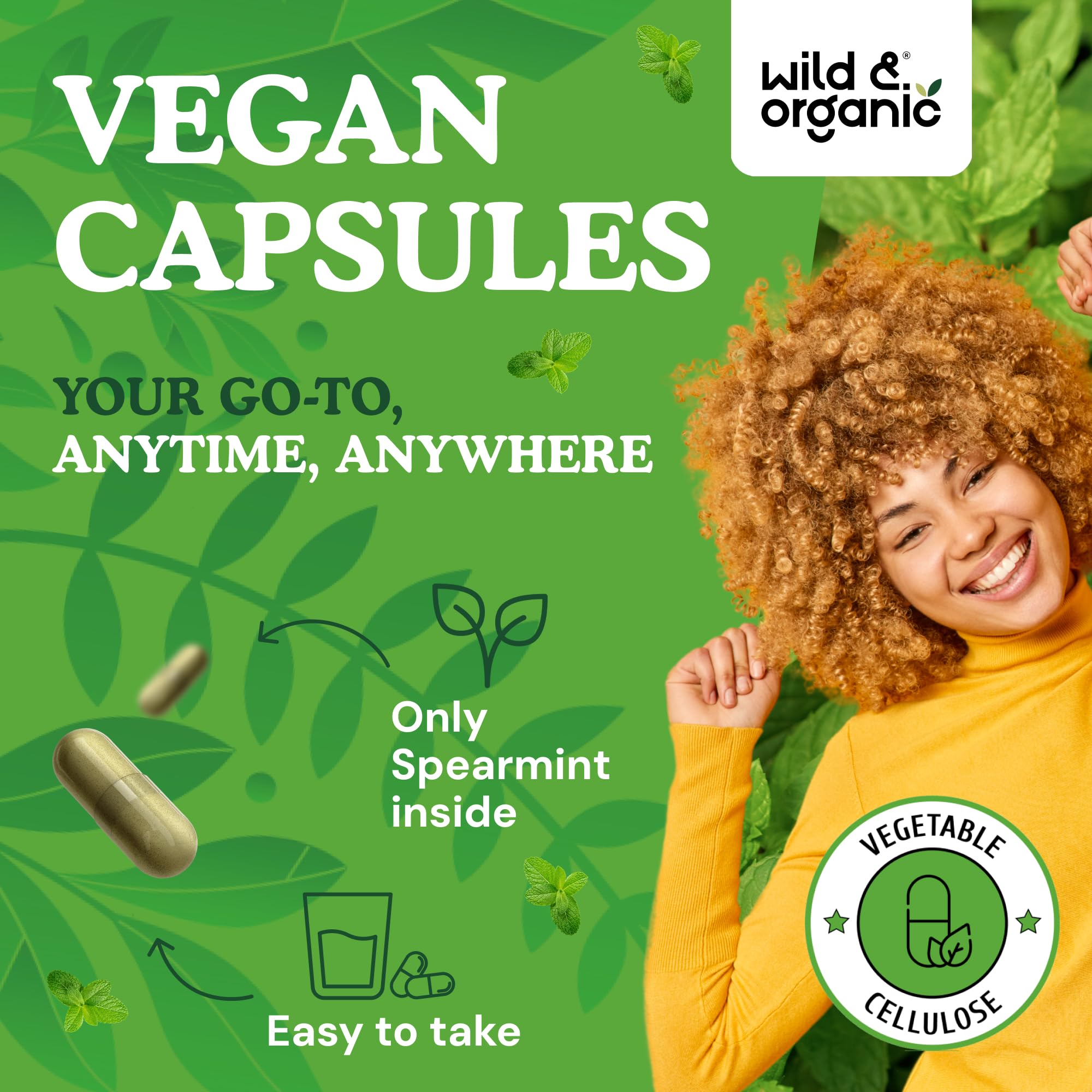 Wild & Organic cápsula en mano para comparar tamaño y facilidad
