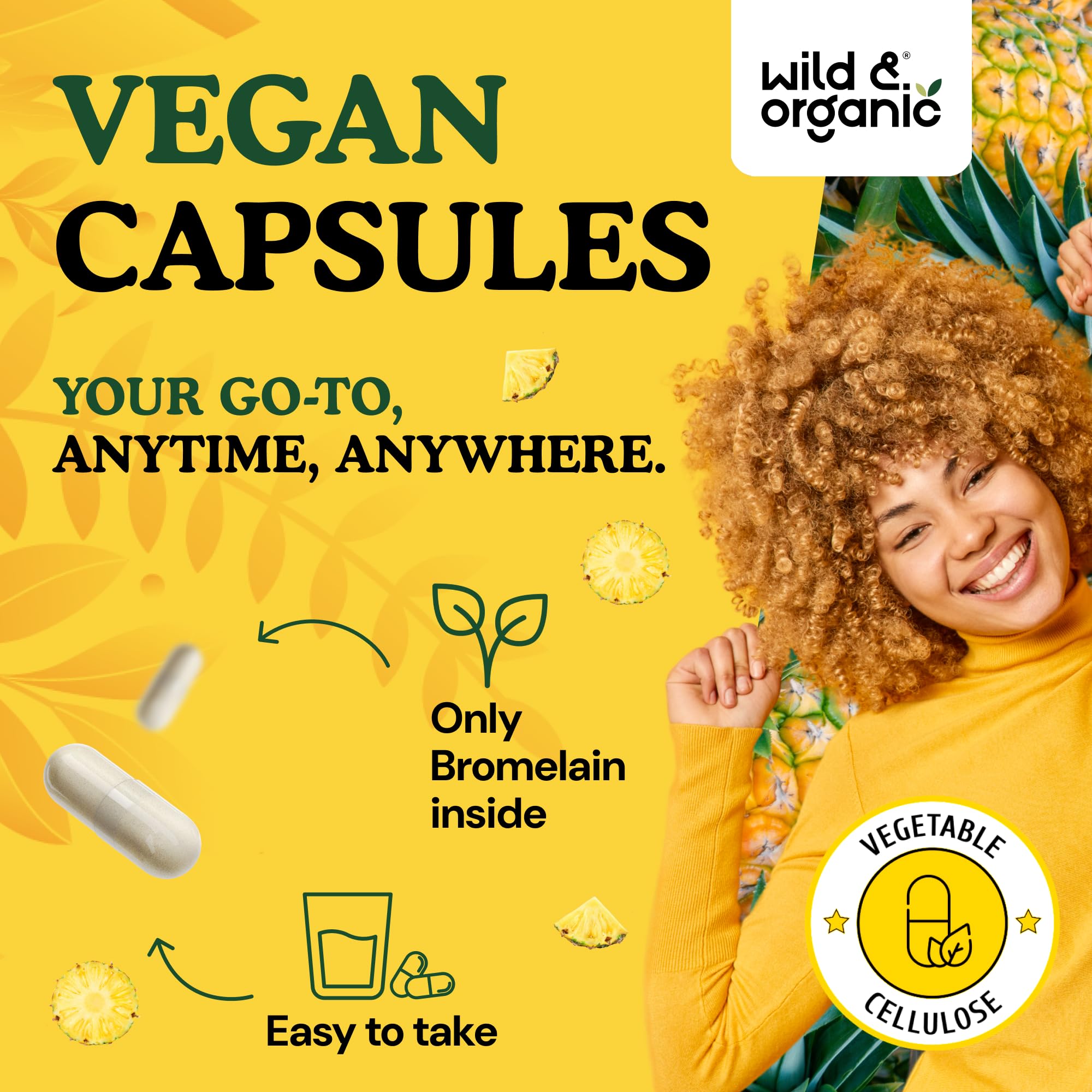 Wild & Organic cápsula en mano para comparar tamaño y facilidad de toma