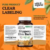 Wild & Organic cápsula junto a moneda para comparar el tamaño