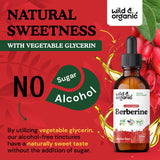 Wild & Organic botella 2 fl oz junto a una regla para ver escala y portabilidad