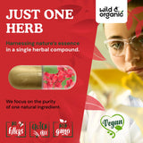 Wild & Organic frasco abierto con cápsulas, muestra cantidad