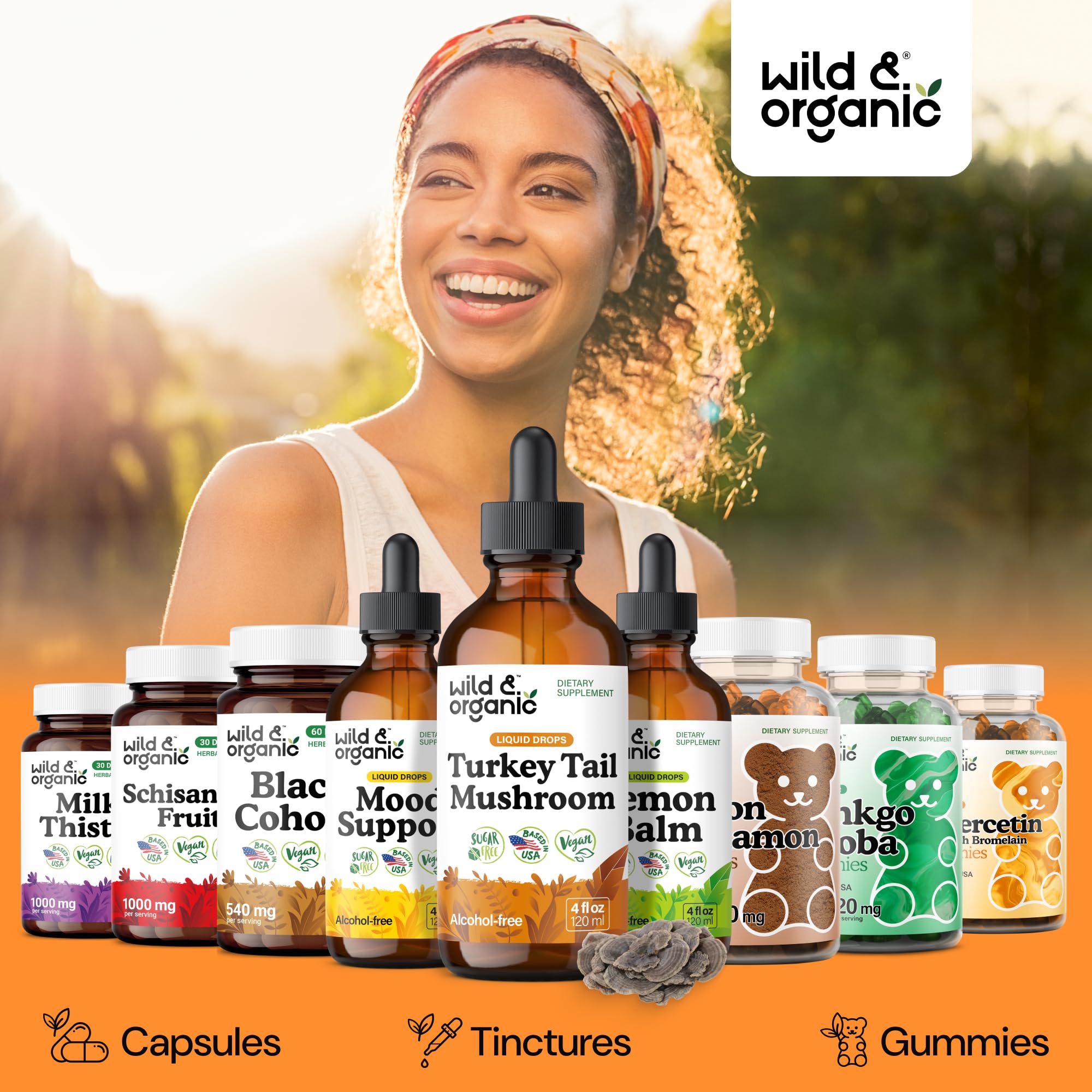 Comparación de tamaño de la botella Wild & Organic en mano, práctico y portátil