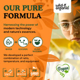 Wild & Organic frasco sobre encimera de cocina en ambiente cotidiano