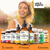 Wild & Organic frasco junto a regla para comparar tamaño portátil