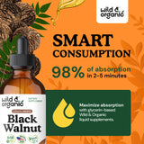 Wild & Organic frasco 4 fl oz junto a una regla para comparar escala