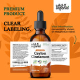 Wild & Organic frasco acompañado de hojas de canela Ceilán naturales