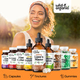 Wild & Organic frasco junto a un vaso batido mostrando compatibilidad de mezcla