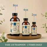 Wise Woman Herbals botella abierta mostrando color del extracto, apariencia natural