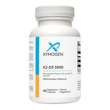 XYMOGEN envase frontal mostrando la marca y beneficio óseo