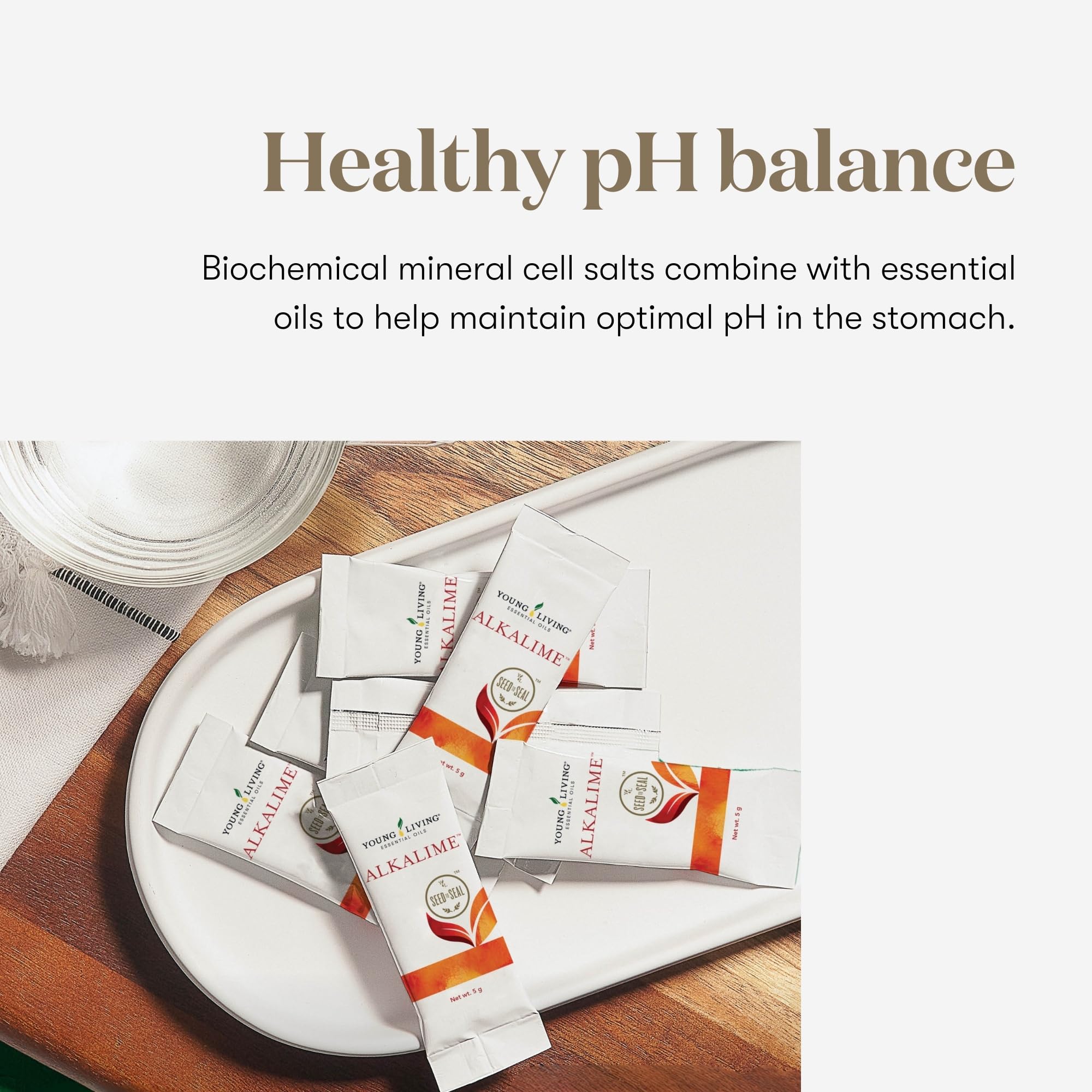 Young Living bebida efervescente en vaso demostrando disolución rápida