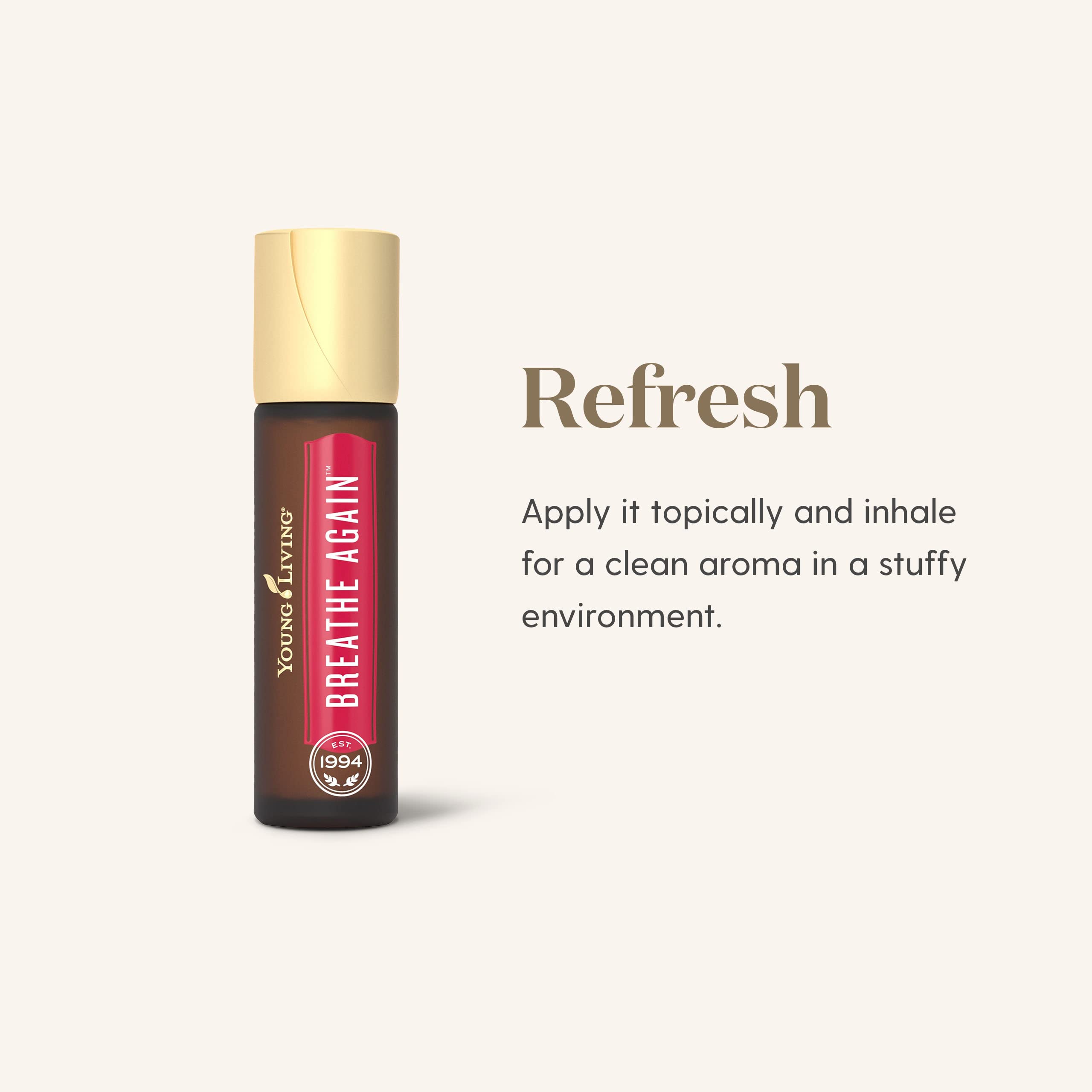 Young Living roll‑on en mano para referencia de tamaño