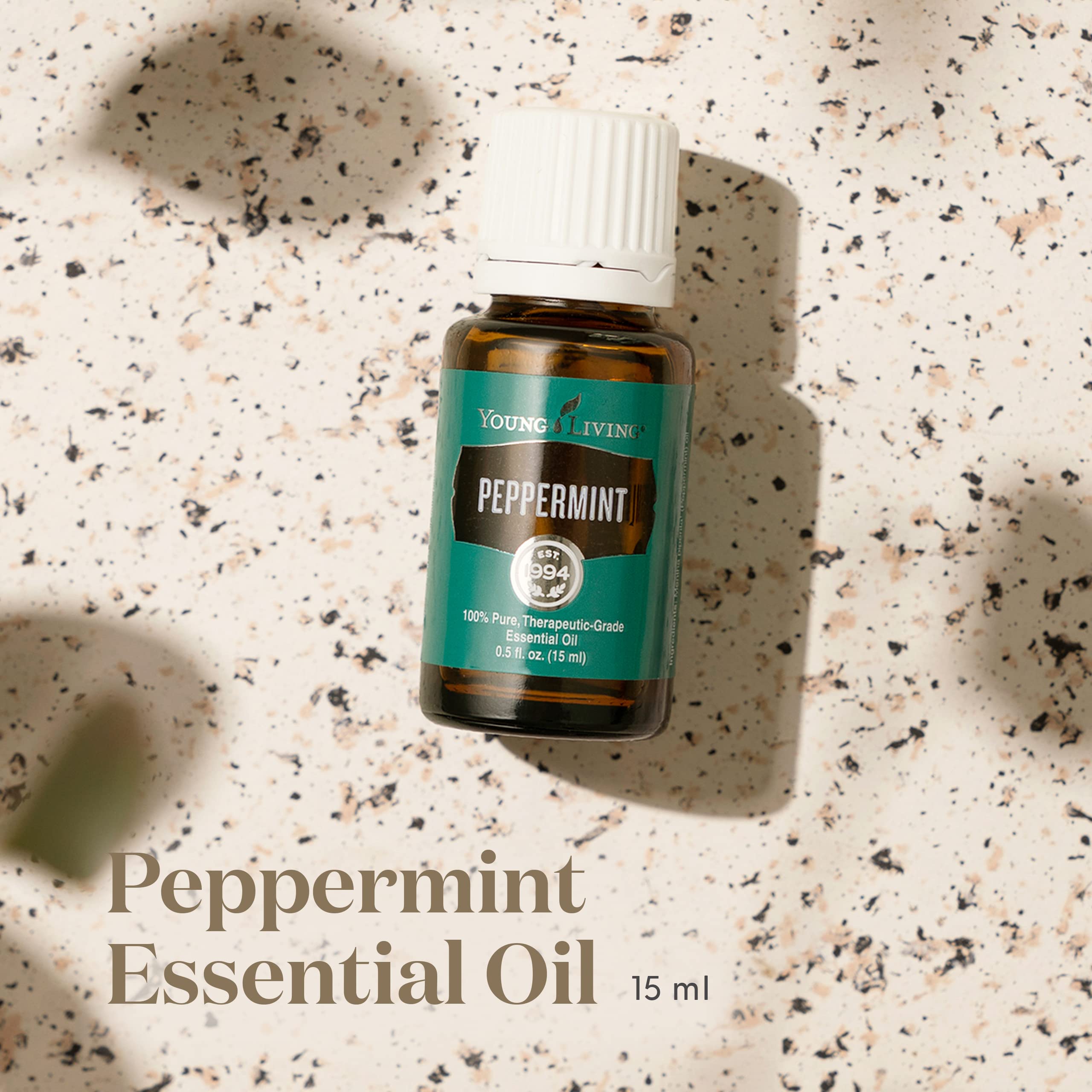 Young Living cuentagotas mostrando control de dosis y precisión