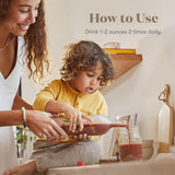 Young Living botella Ningxia Red abierta lista para servir con cierre visible