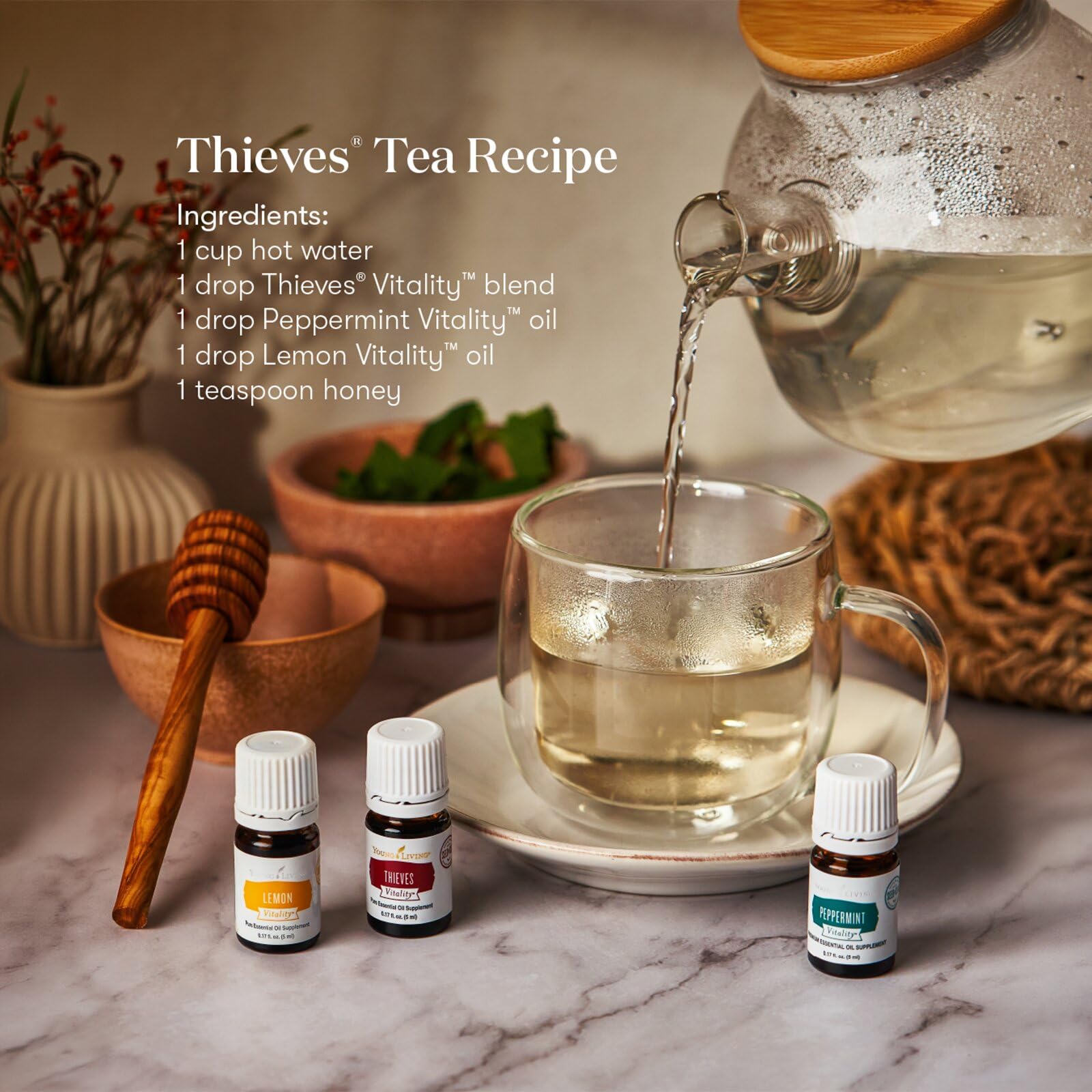Young Living frasco junto a moneda para comparar tamaño compacto para viajar