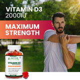 Zaytun Vitamins gomitas D3 en mano para comparación de tamaño y dosis visible